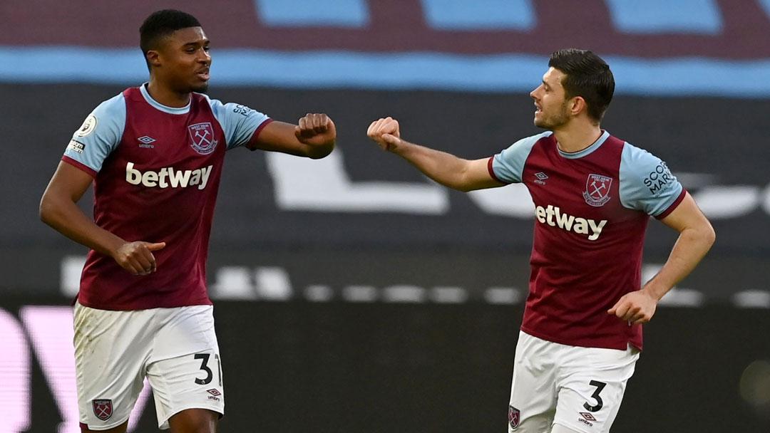 Aaron Cresswell celebrates with Ben Johnson