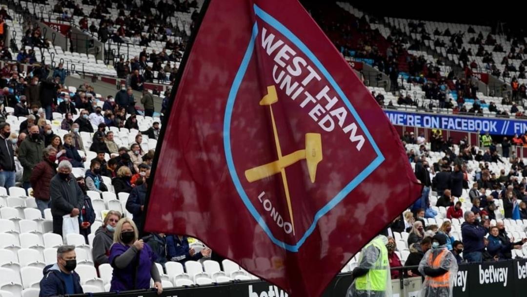 A flag bearer at the game against Southampton