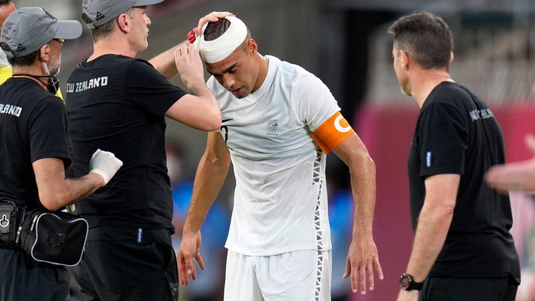 Winston Reid gets patched up in New Zealand's victory over South Korea