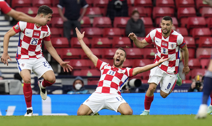 Nikola Vlašić celebrates scoring one of his seven goals for Croatia