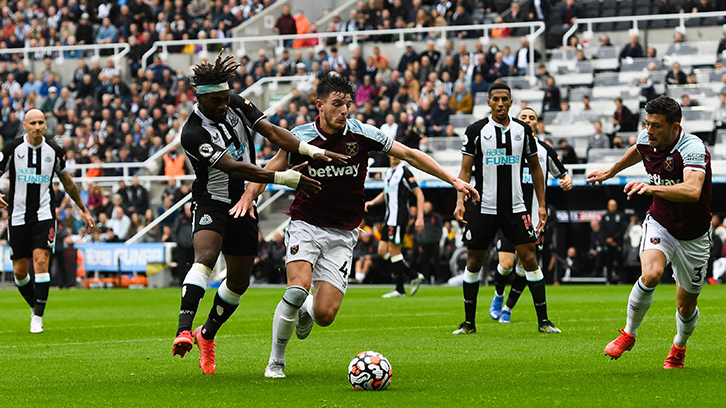 Saint-Maximin is tackled by Rice