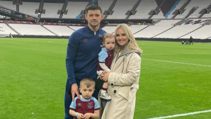 Aaron Cresswell with wife Jess and children