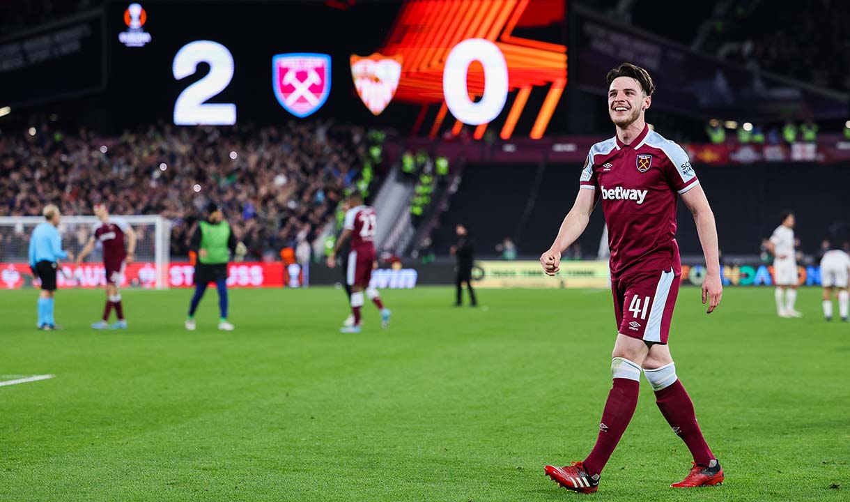 Declan Rice celebrates the win over Sevilla