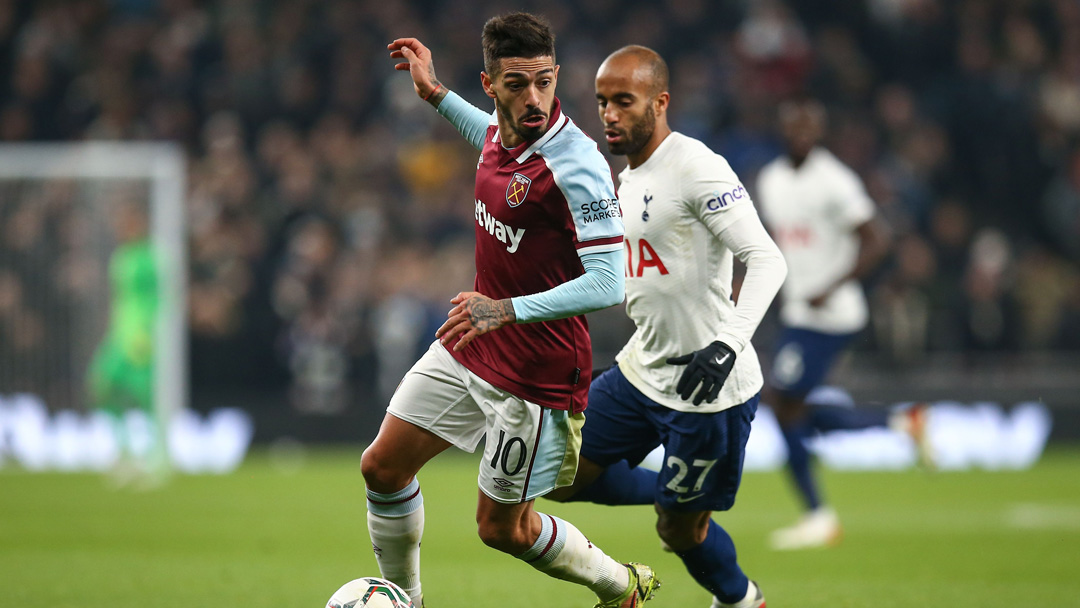 Manuel Lanzini in action against Tottenham's Lucas Moura