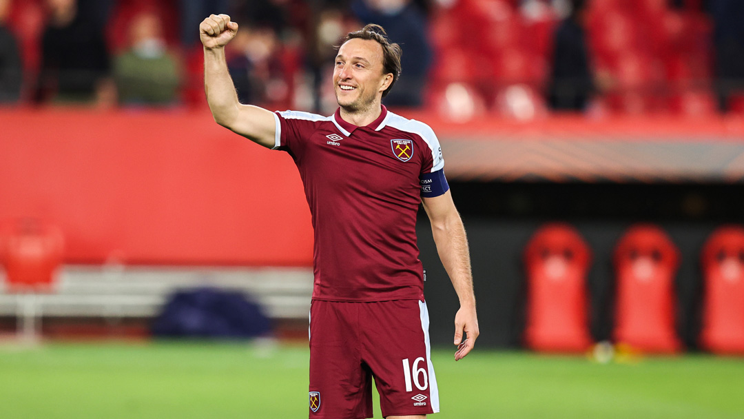 Mark Noble acknowledges the West Ham fans in Seville
