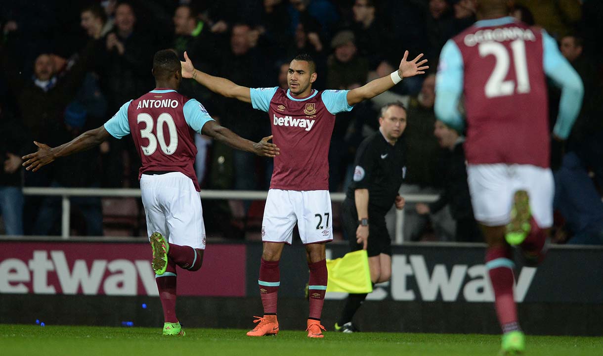 Michail Antonio celebrates with Dimitri Payet after scoring against Tottenham Hotspur