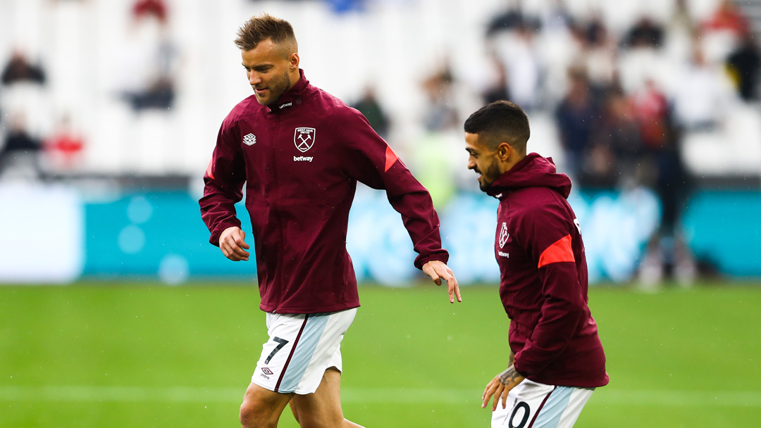 Andriy Yarmolenko and Manuel Lanzini warm-up at London Stadium