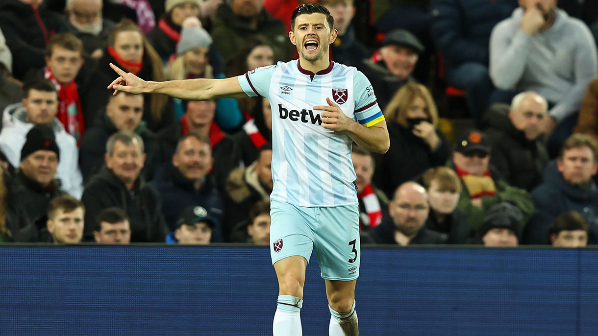 Cresswell wearing the captain's armband at Anfield