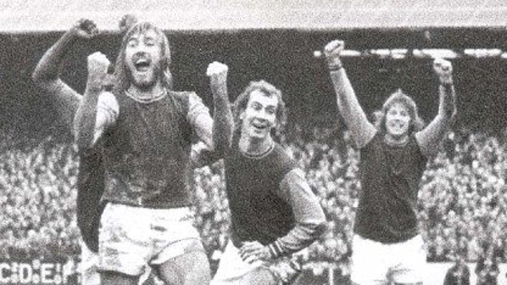 Alan Wooler (centre) celebrates victory over Manchester United in January 1974