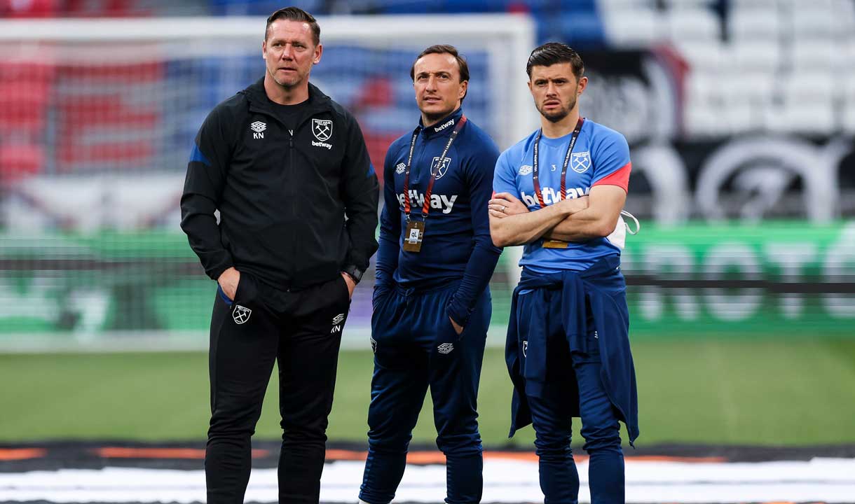 Aaron Cresswell with Kevin Nolan and Mark Noble in Lyon