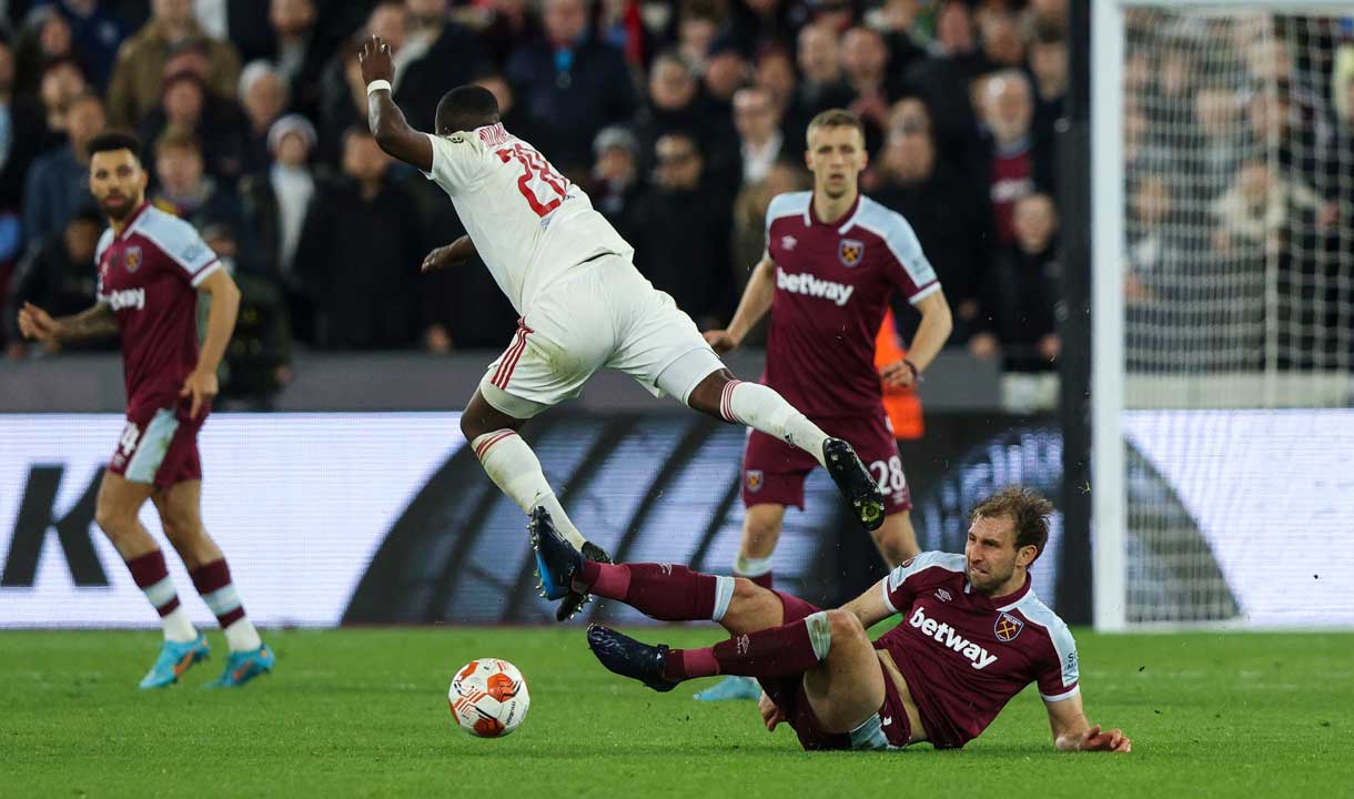 Craig Dawson tackles Tanguy Ndombélé