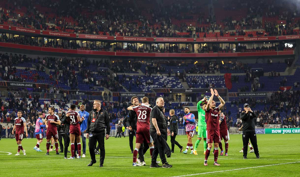 West Ham players celebrate at full-time at Lyon