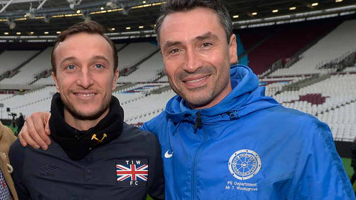 Mark Noble with his old Royal Docks Community School teacher and coach Tom Woolsgrove