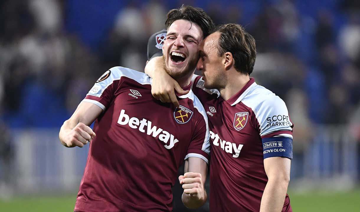 Declan Rice and Mark Noble celebrate at Lyon