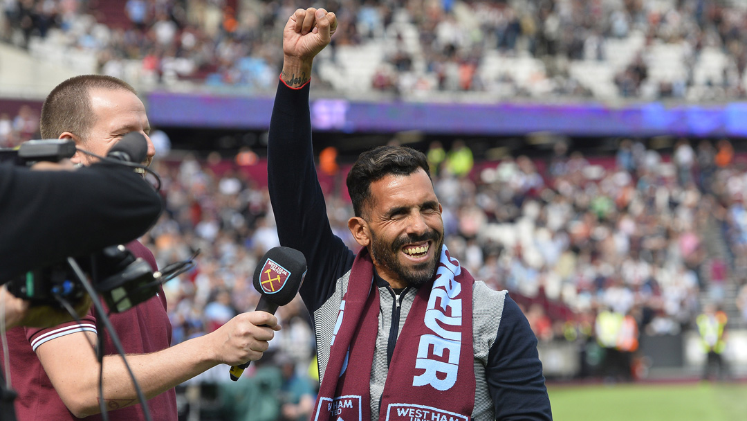 Carlos Tevez acknowledges the Claret and Blue Army