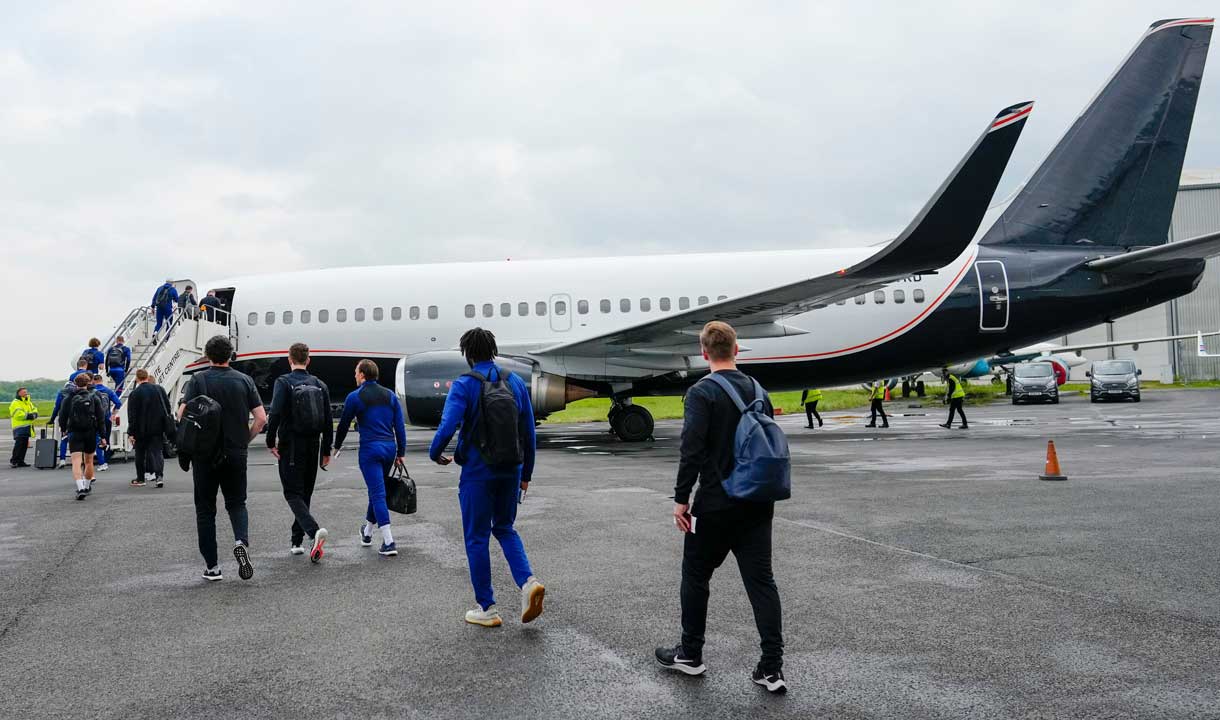 West Ham United players board an aeroplane to depart for Frankfurt