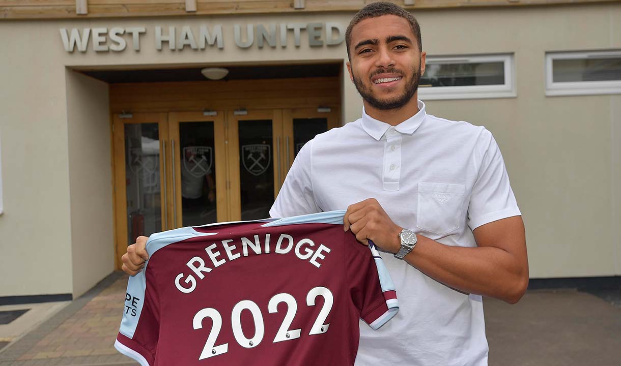 Will Greenidge poses with a West Ham shirt