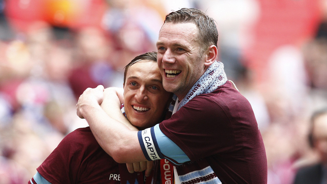 Mark Noble and Kevin Nolan celebrate winning promotion in 2012