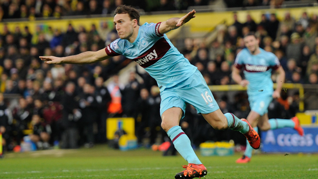 Mark Noble celebrates scoring at Carrow Road