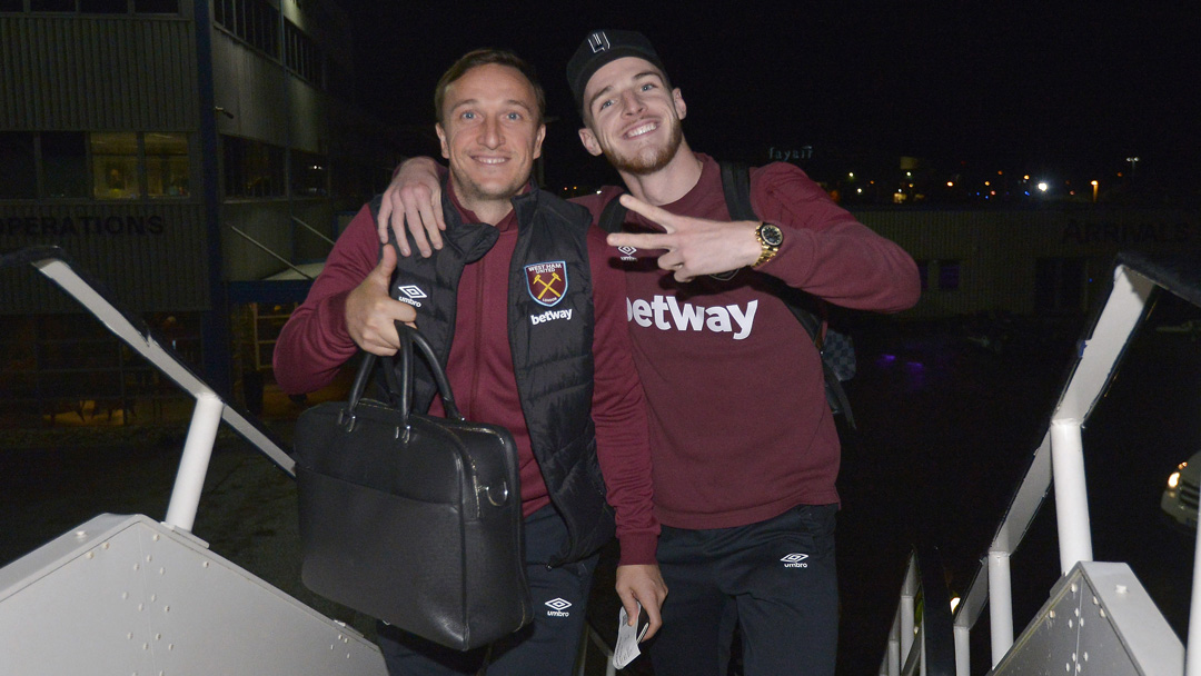 Mark Noble and Declan Rice board a plane
