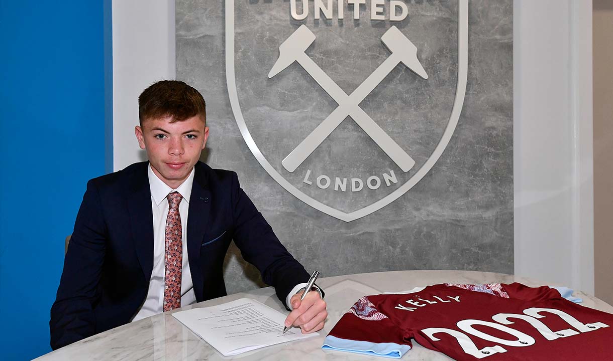 Patrick kelly signs his contract with West Ham United