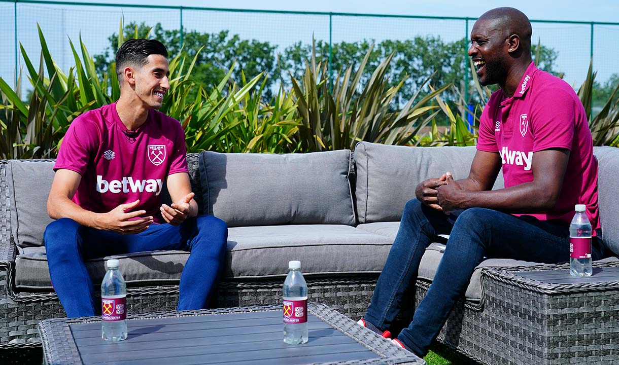 Aguerd chats with Carlton Cole