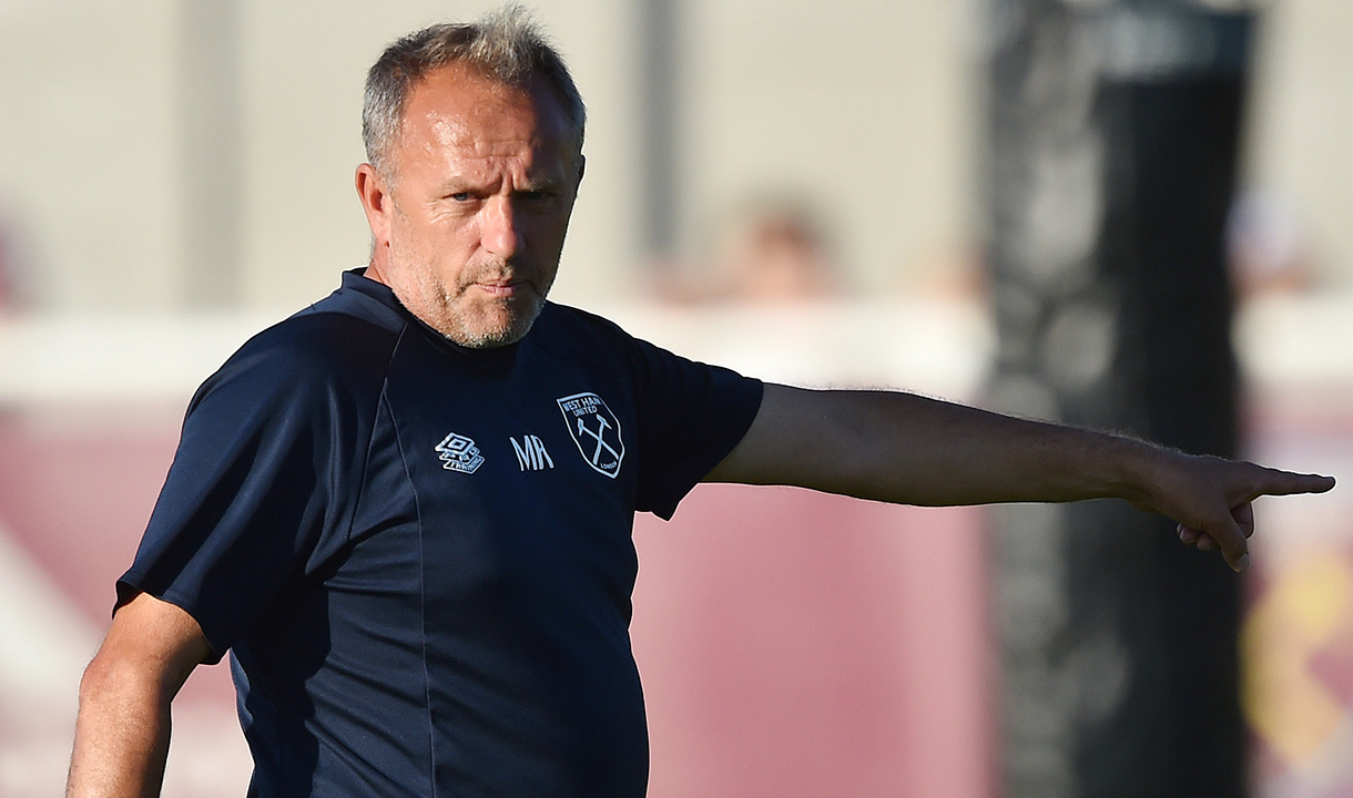 Mark Robson in the dug out for West Ham United U21s v Arsenal U21s