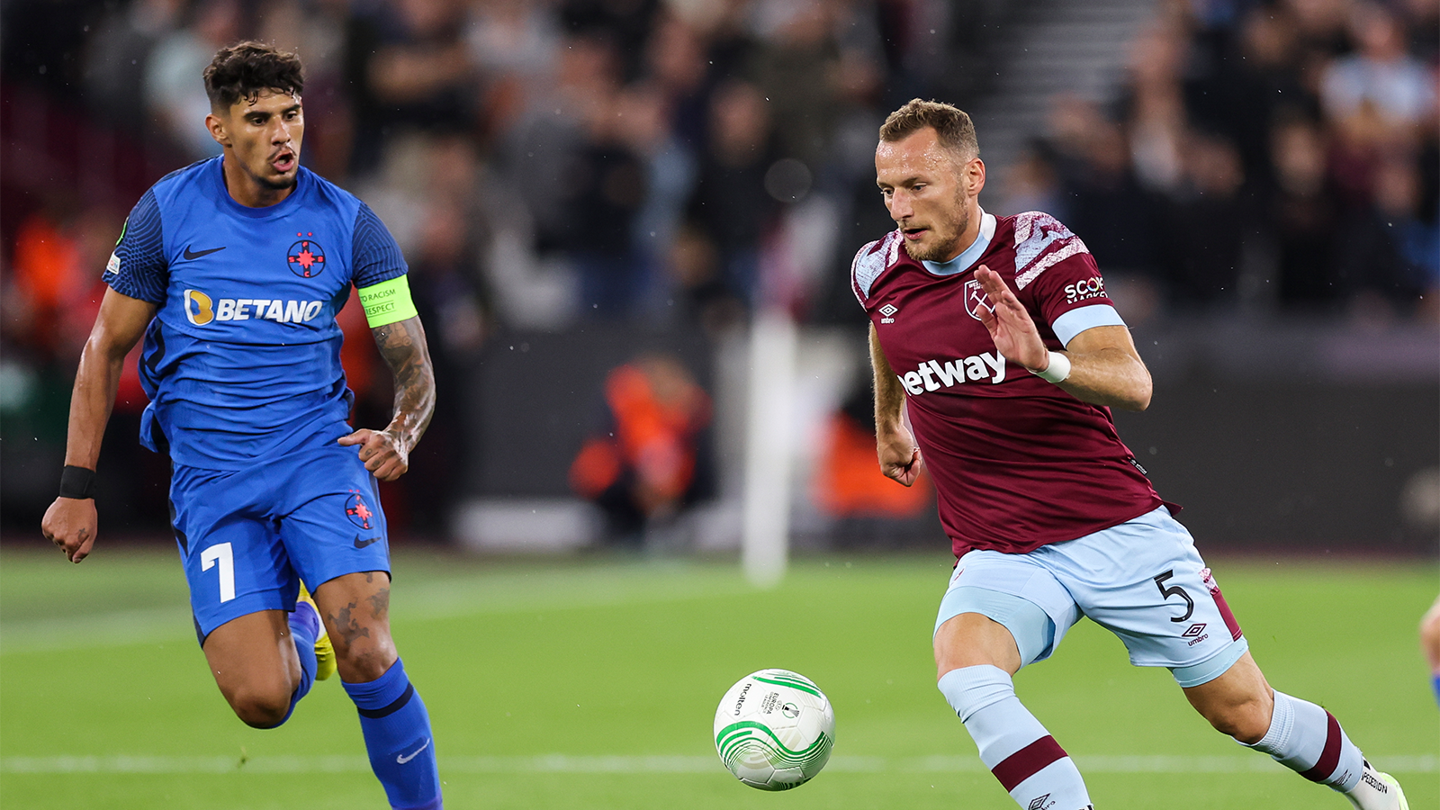 Vladimír Coufal challenges for the ball against FCSB