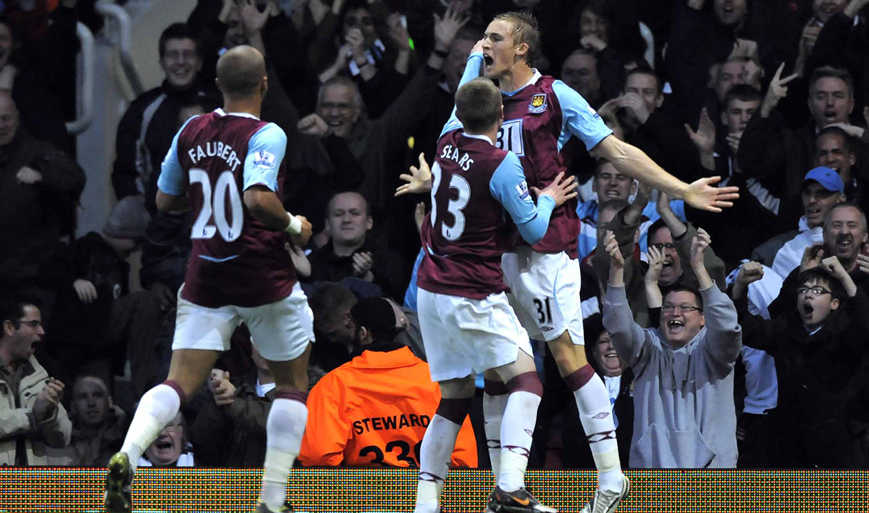 Sears celebrates with Jack Collison