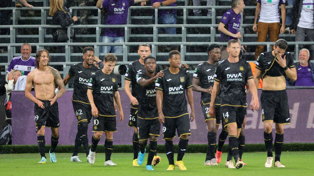 Anderlecht players celebrate scoring against Silkeborg