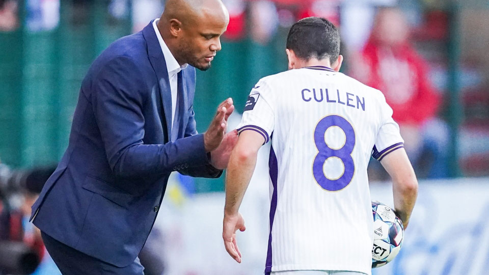 Josh Cullen with Vincent Kompany