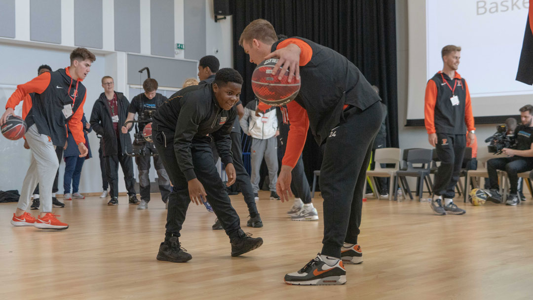 Foundation leads NCAA basketball teams’ community activations 