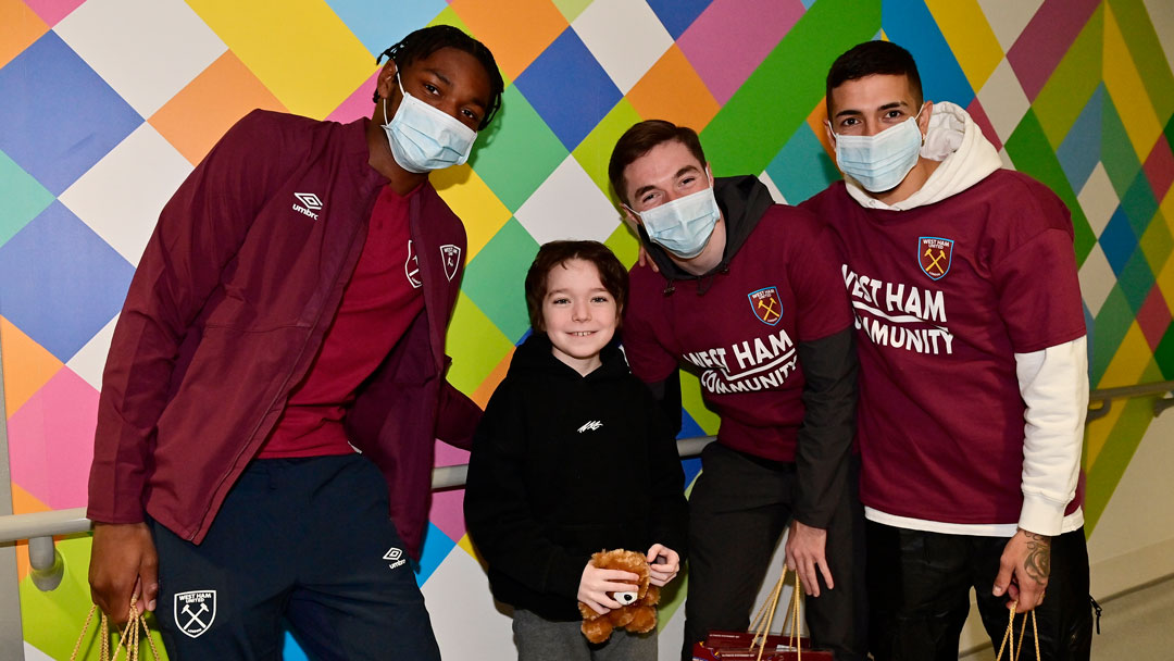 Young fan Buster welcomed the players to the Rainbow Centre