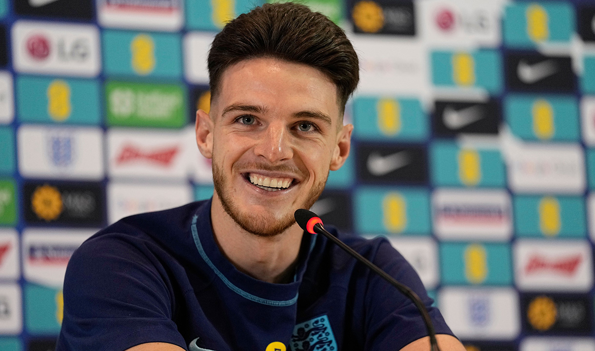 Declan Rice smiles at an England press conference