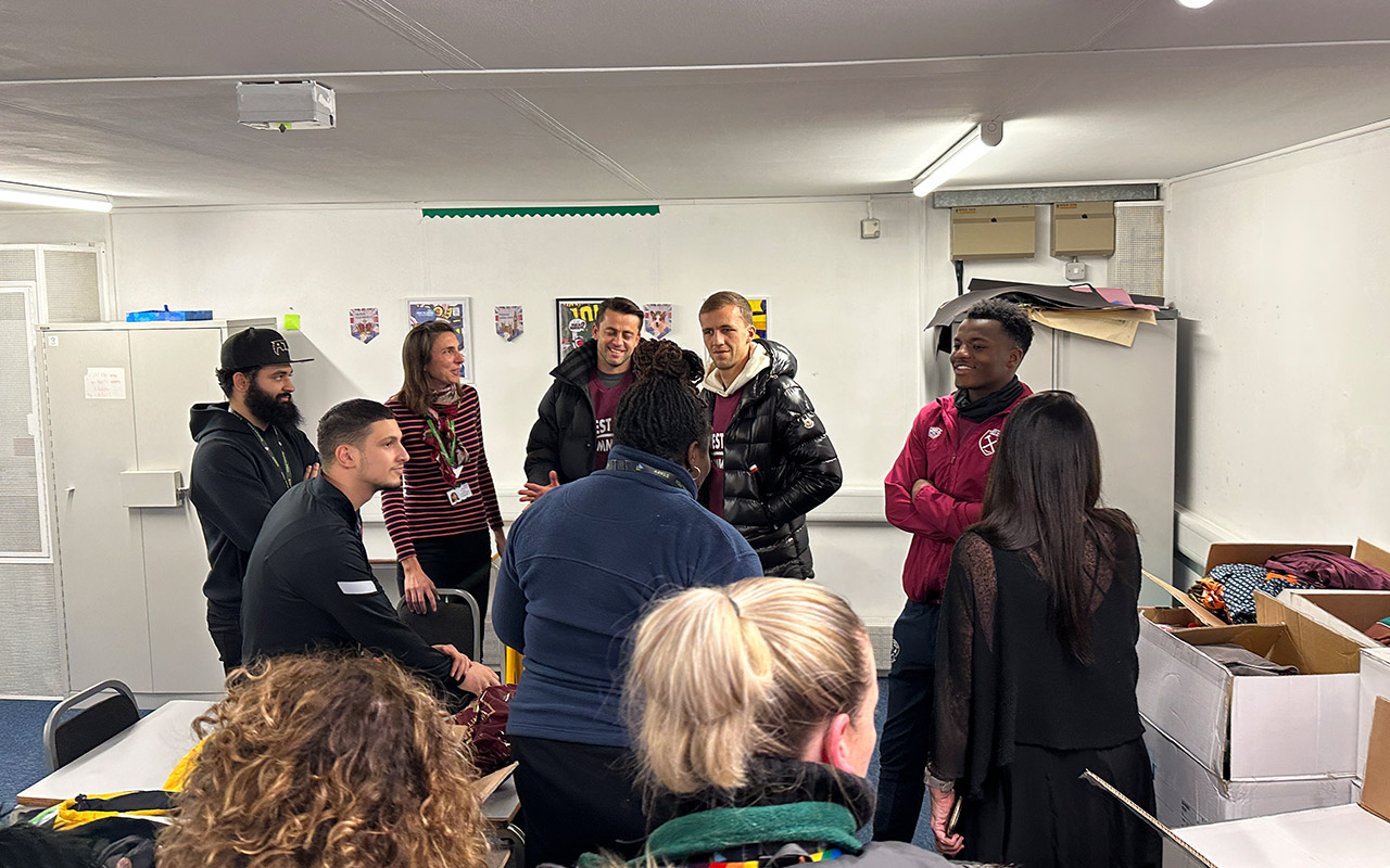 Fabianski, Soucek and Laing meeting the team at Tunmarsh School