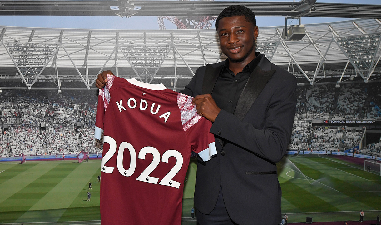 Gideon Kodua poses with a shirt