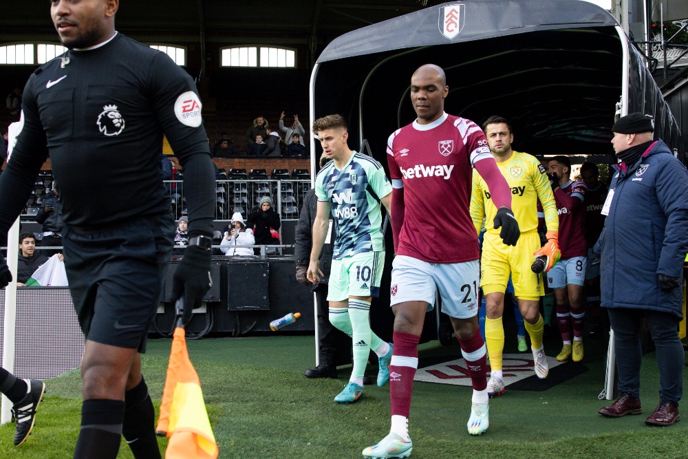 Angelo Ogbonna leads the Hammers out at Fulham