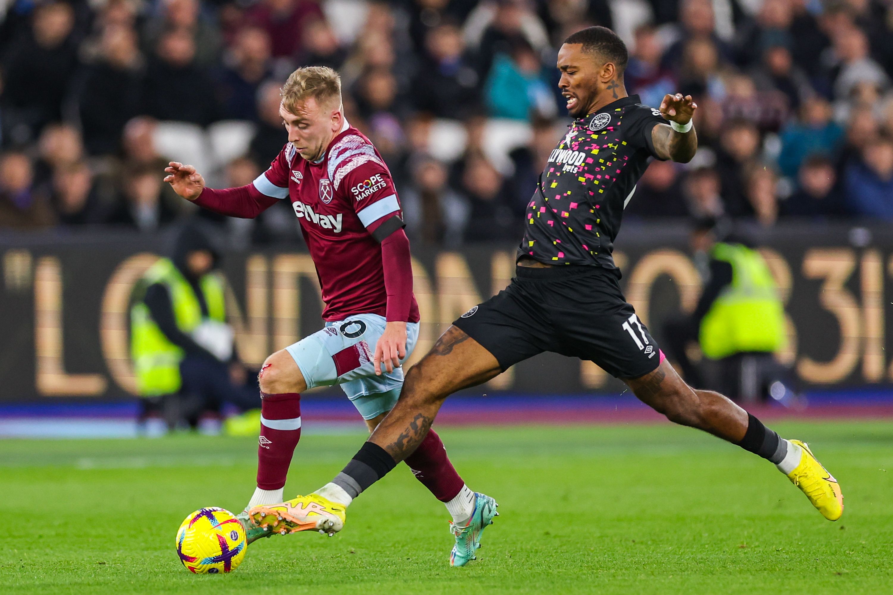 Jarrod Bowen is fouled by Ivan Toney