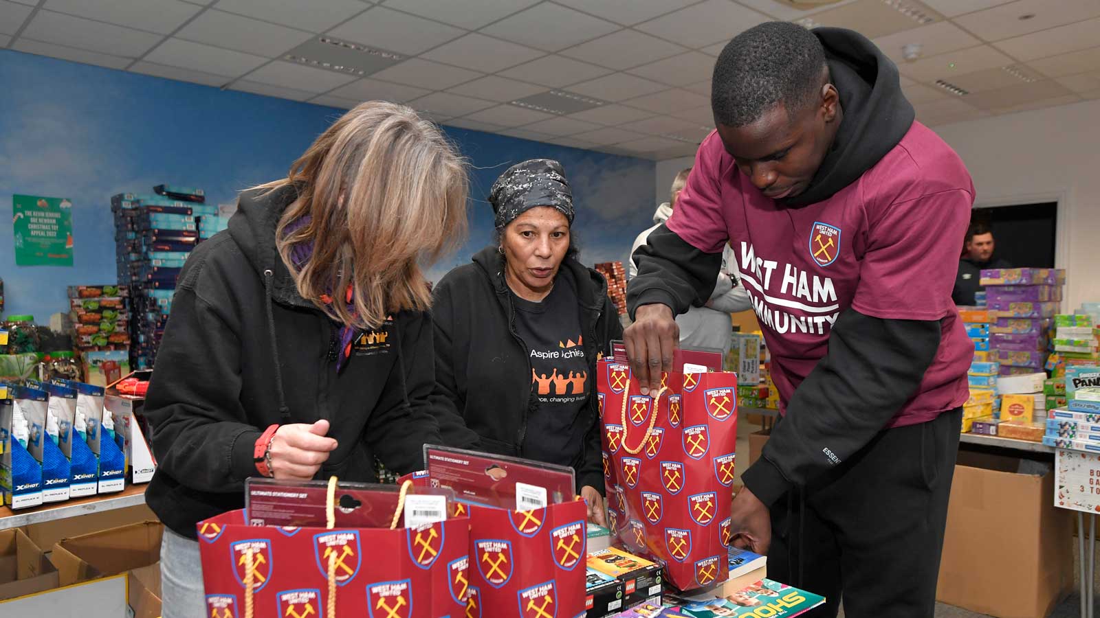 Kurt Zouma helps packs presents for local children in need in Newham