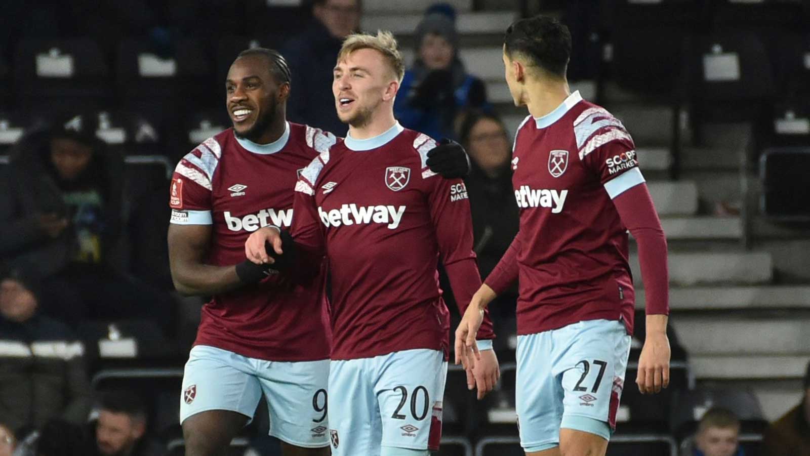 Michail Antonio and Jarrod Bowen celebrate the Hammers' second goal at Derby