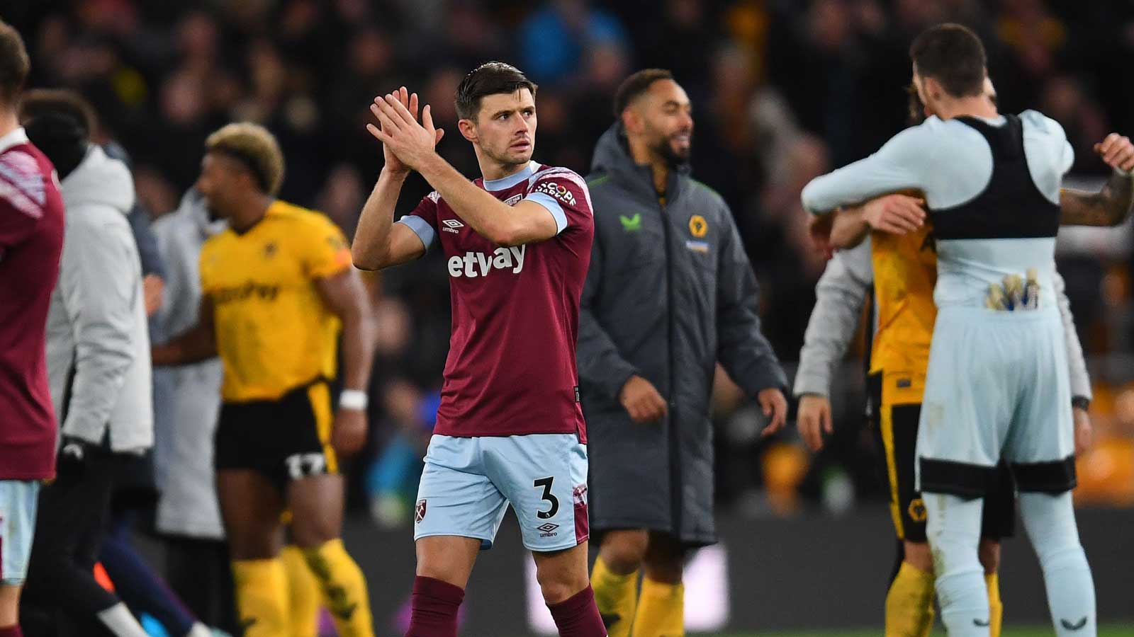 Aaron Cresswell applauds the Hammers fans at Wolves