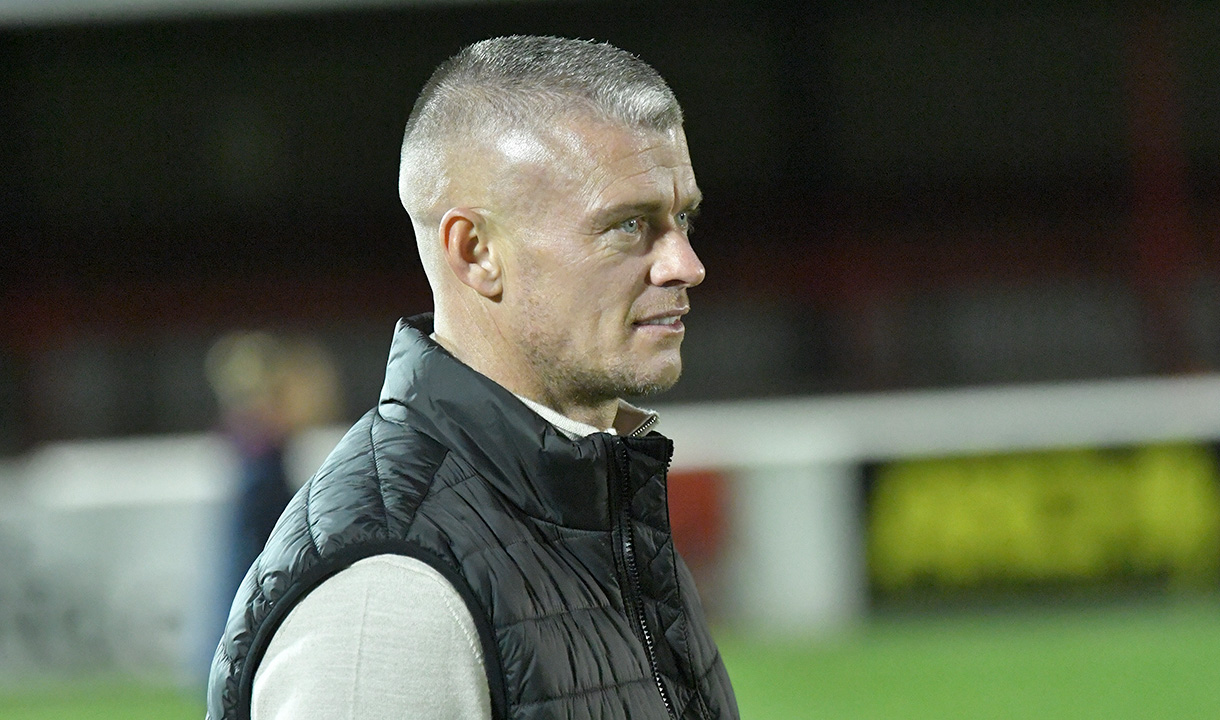 Paul Konchesky watches on as West Ham take on Man City