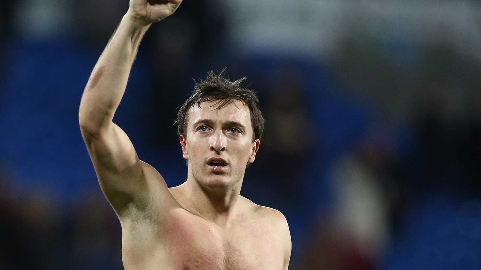 Mark Noble celebrates the Hammers' victory at Cardiff in January 2014