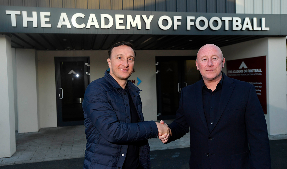 Kenny Brown and Mark Noble outside Chadwell Heath