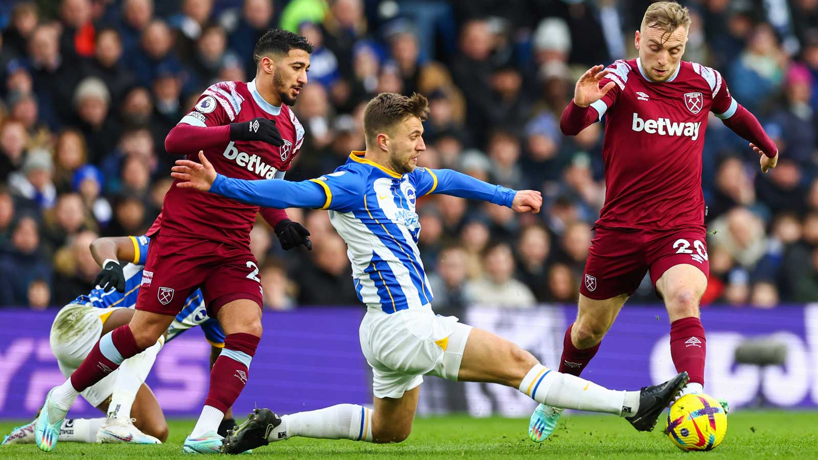 Jarrod Bowen is challenged by Brighton's Jöel Veltman