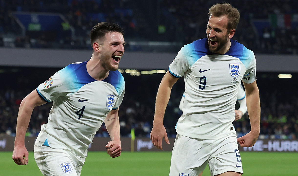 Rice celebrates with Harry Kane