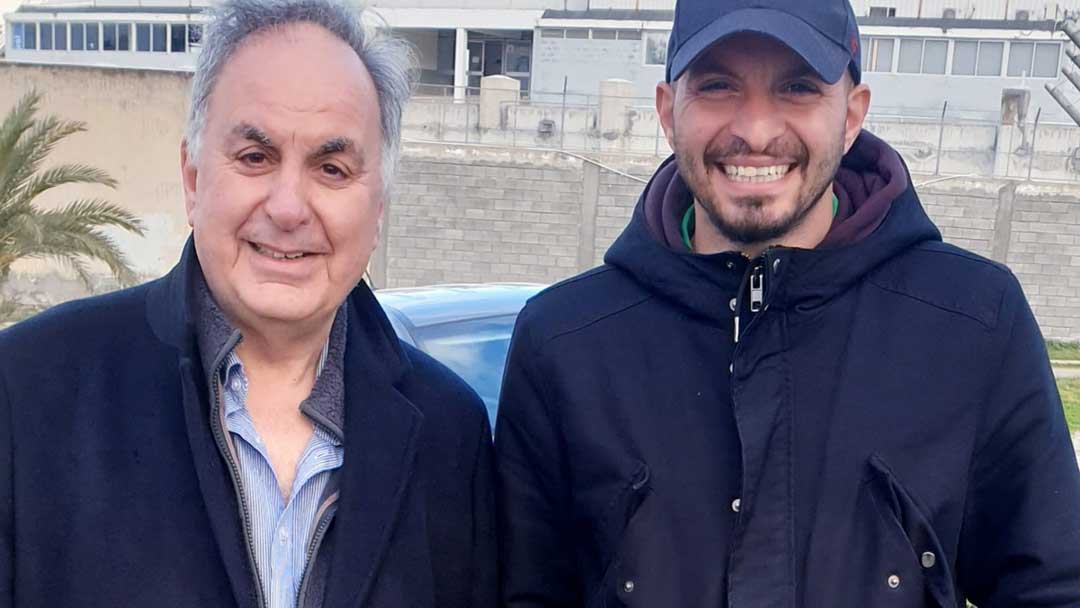 Michael with his son Dimitri, who works with AEK Larnaca's Academy