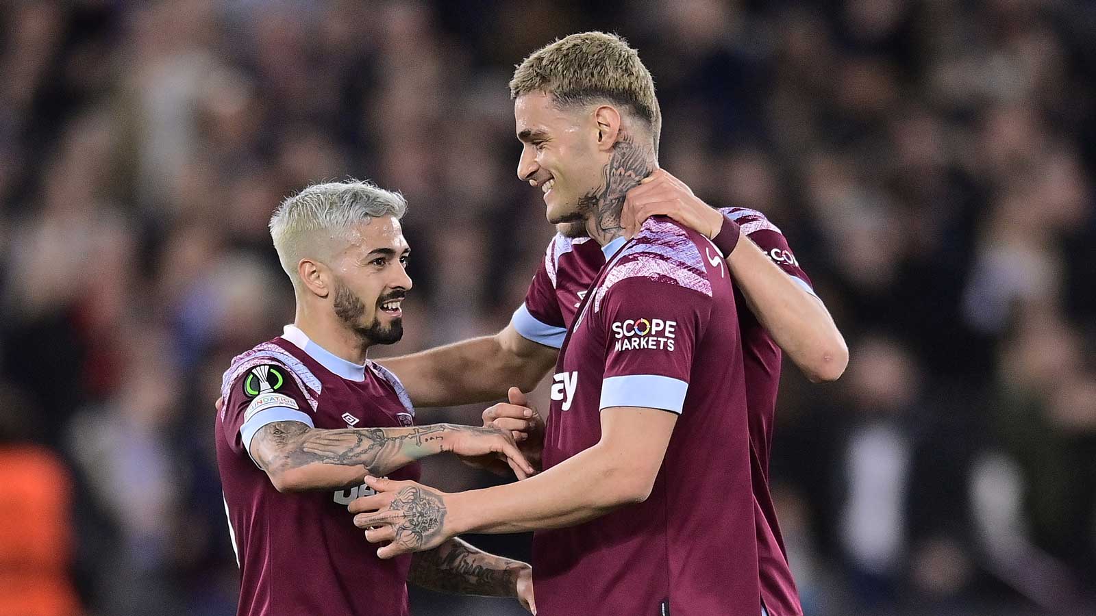 Gianluca Scamacca celebrates with Manuel Lanzini