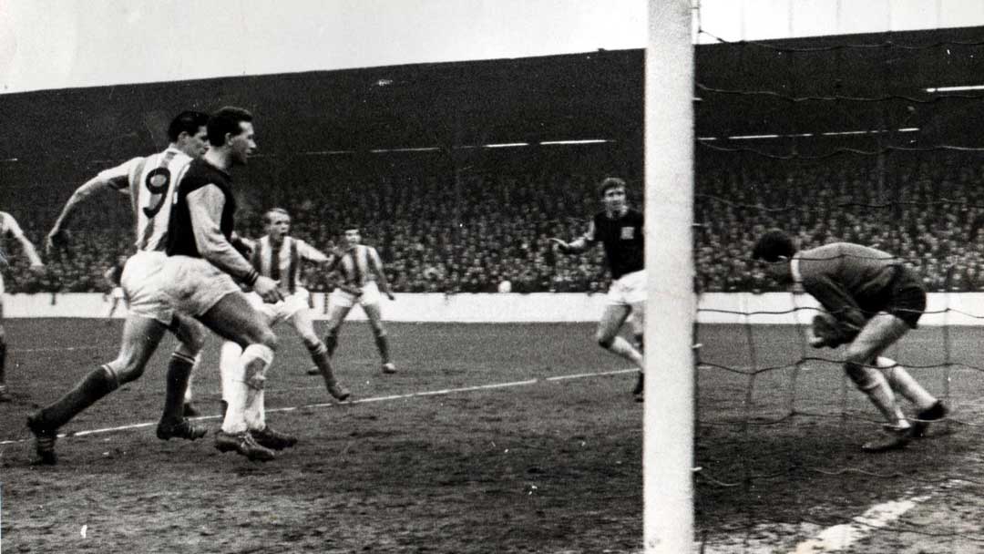Alan Dickie makes a save against Stoke City at the Boleyn Ground in March 1964