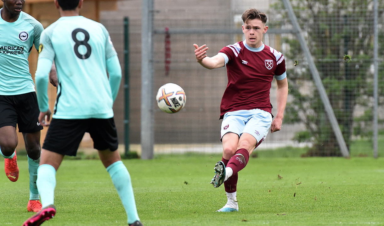 Lewis Orford tries a pass versus Brighton